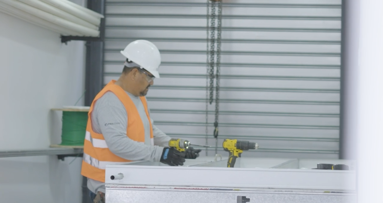 Factory technician assembling components